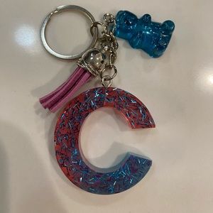 Handmade pink and blue with confetti resin C keychain with resin gummy bear